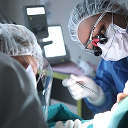 Dentists performing surgery